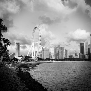 Buildings in city against sky
