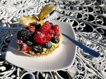 High angle view of strawberries in plate