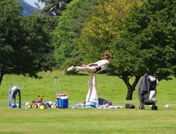 People relaxing in park