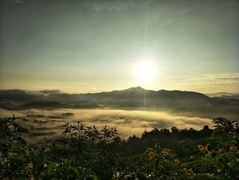 Scenic view of landscape against sky during sunset