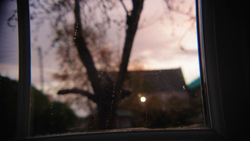 Close-up of wet window in rainy season