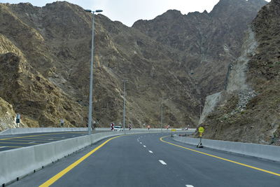 Road leading towards mountains