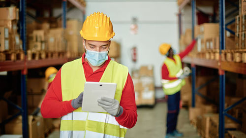 Factory worker using tablet