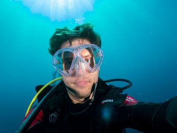 Portrait of young man in underwater