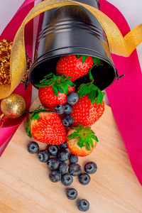 High angle view of strawberries on table