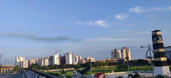 Modern buildings in city against sky