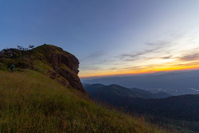 Scenic view of mountains against sky during sunset