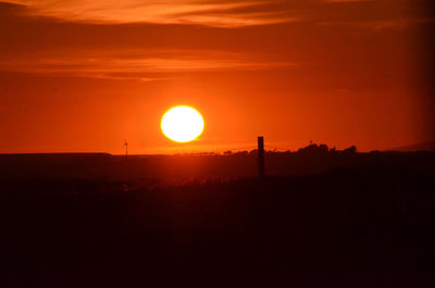 Scenic view of sunset over landscape