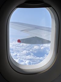 View of sky seen through airplane window