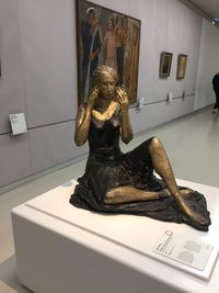 Statue of woman in museum