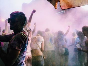 Group of people enjoying color festival