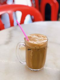 Close-up of coffee cup on table