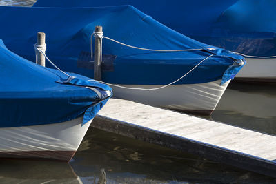 Sailing boats at the pier at the lake chiemsee in bavaria