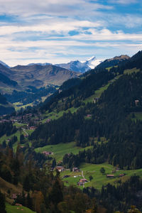 High angle view of trees and mountains against sky