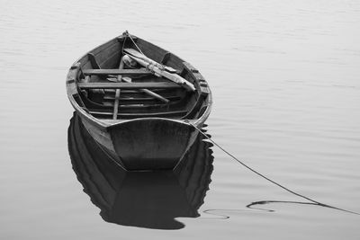 Boat moored on lake