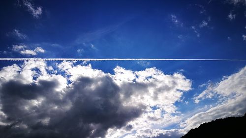 Low angle view of vapor trail in sky