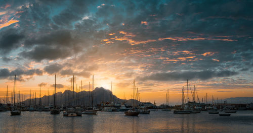 Beautiful sunset over monte cara mountain in hardor of mindelo. sao vicente cape verde