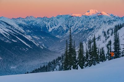 Scenic view of snow covered mountains against sky