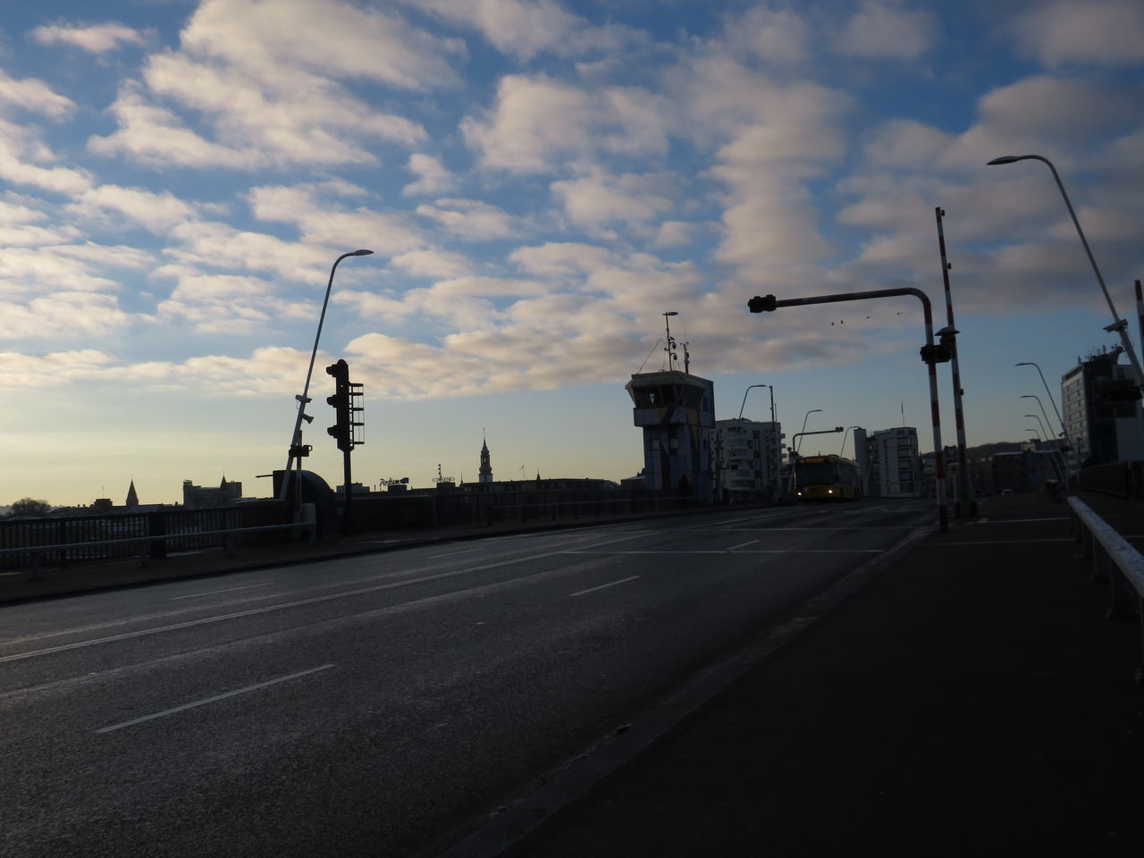 EMPTY ROAD AGAINST CLOUDY SKY