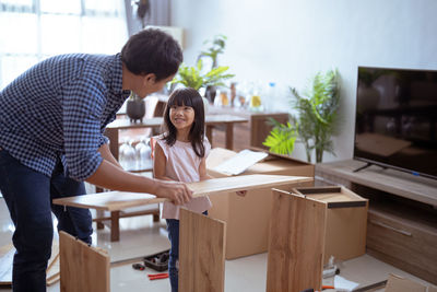 Side view of man working at home