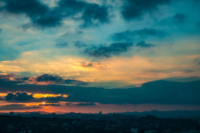 Scenic view of dramatic sky during sunset