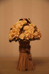 Close-up of flower vase on table