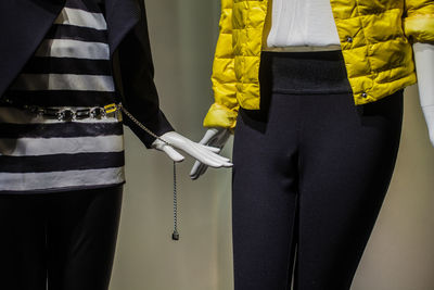 Cropped image of mannequins in store