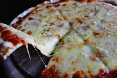 Close-up of pizza on cutting board