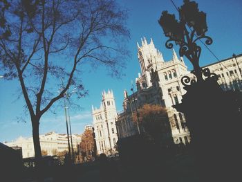 Low angle view of built structure against blue sky