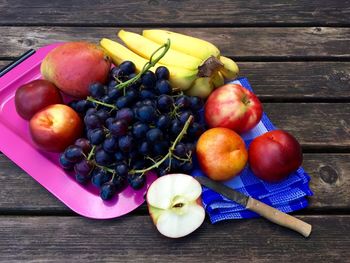 Close-up of apples in container on table