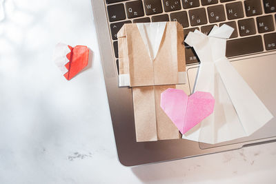 High angle view of heart shape on paper