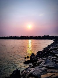 Scenic view of sea against sky during sunset