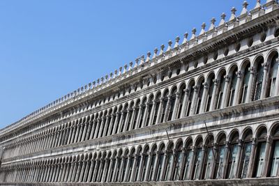 Low angle view of historical building against clear sky
