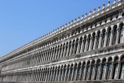 Low angle view of historical building against clear sky