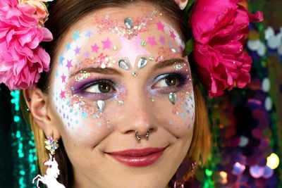 Close-up of thoughtful young female model with make-up