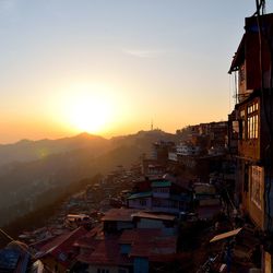 High angle view of townscape against sky during sunset