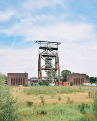 Low angle view of abandoned building against sky