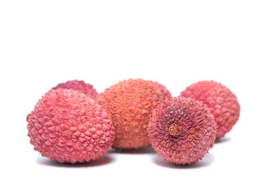 Close-up of strawberry over white background