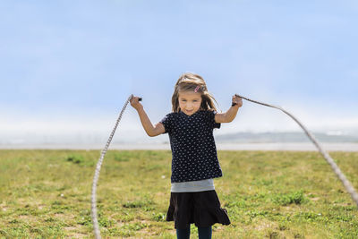 Cute girl playing with rope