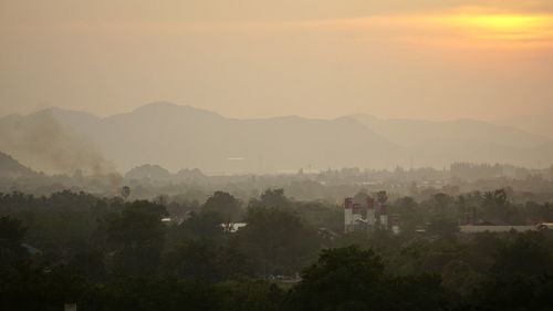 Scenic view of mountains against sky during sunset