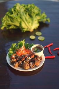 Close-up of food served on table