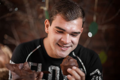 Portrait of young man smiling