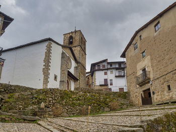 Low angle view of buildings against sky