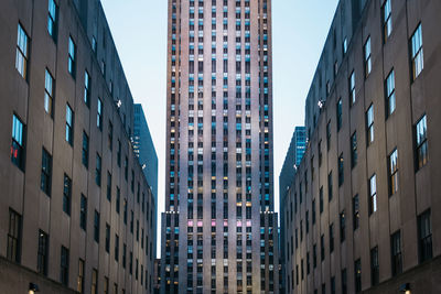 Low angle view of buildings against clear sky