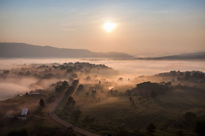 Panoramic view of landscape against sky during sunset