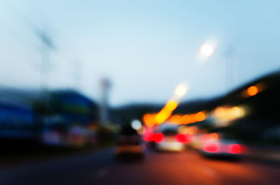 Close-up of traffic on road at night