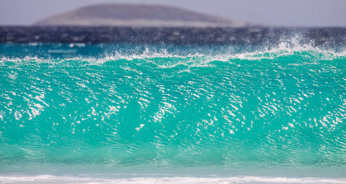 Close-up of water splashing in swimming pool