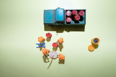 High angle view of candies on table against wall