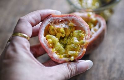 Close-up of person holding food