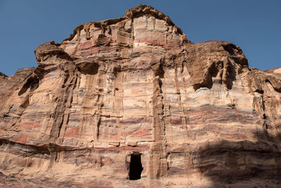 Low angle view of cave in rock formation at petra